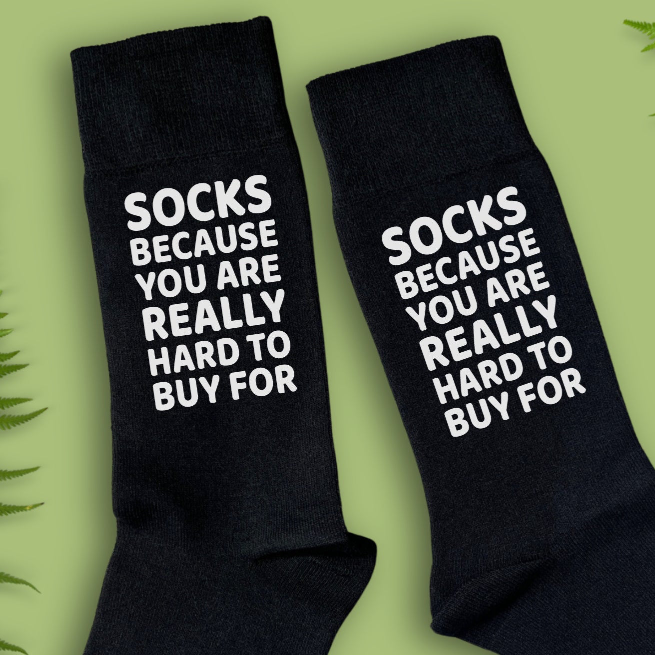 Close up of socks with you are hard to buy for message