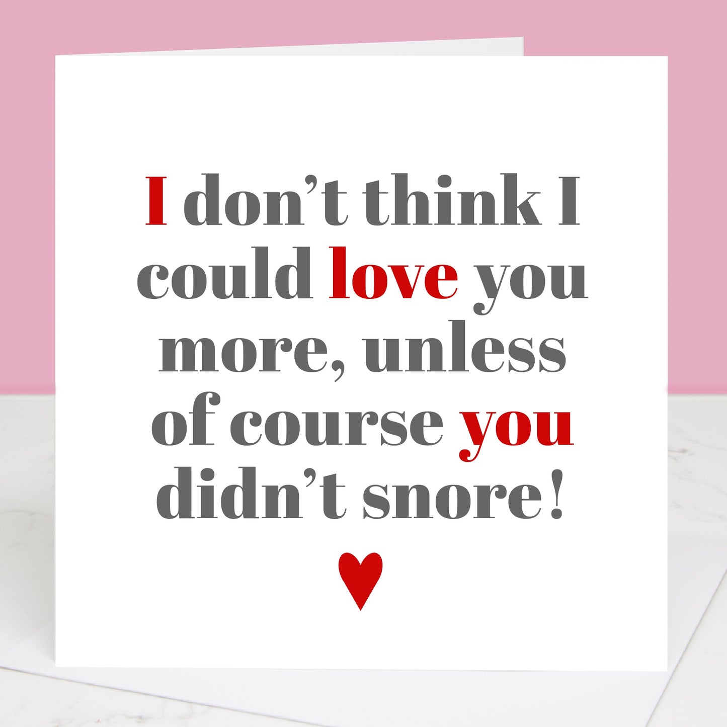 A Valentine's Day card with a humorous message about snoring, predominantly white with red and grey text, and a small red heart icon. All images & designs © Slice of Pie Designs