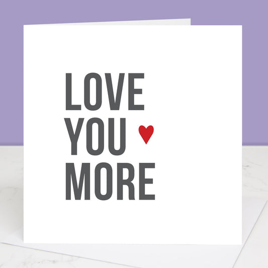Romantic card with love you more written in bold with small red heart. All images & designs © Slice of Pie Designs