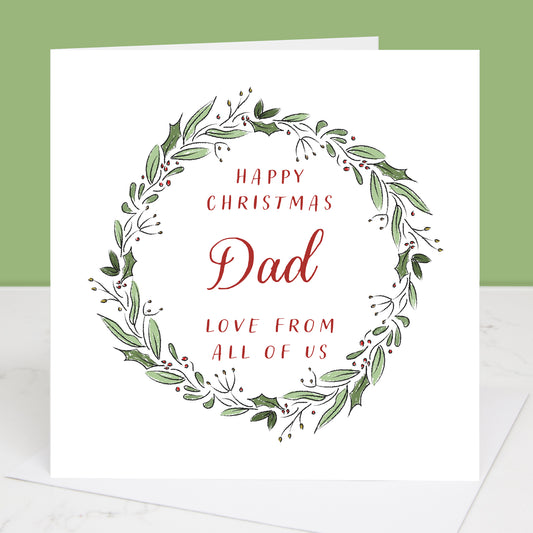 Christmas card for Dad with green wreath and red text on a white background