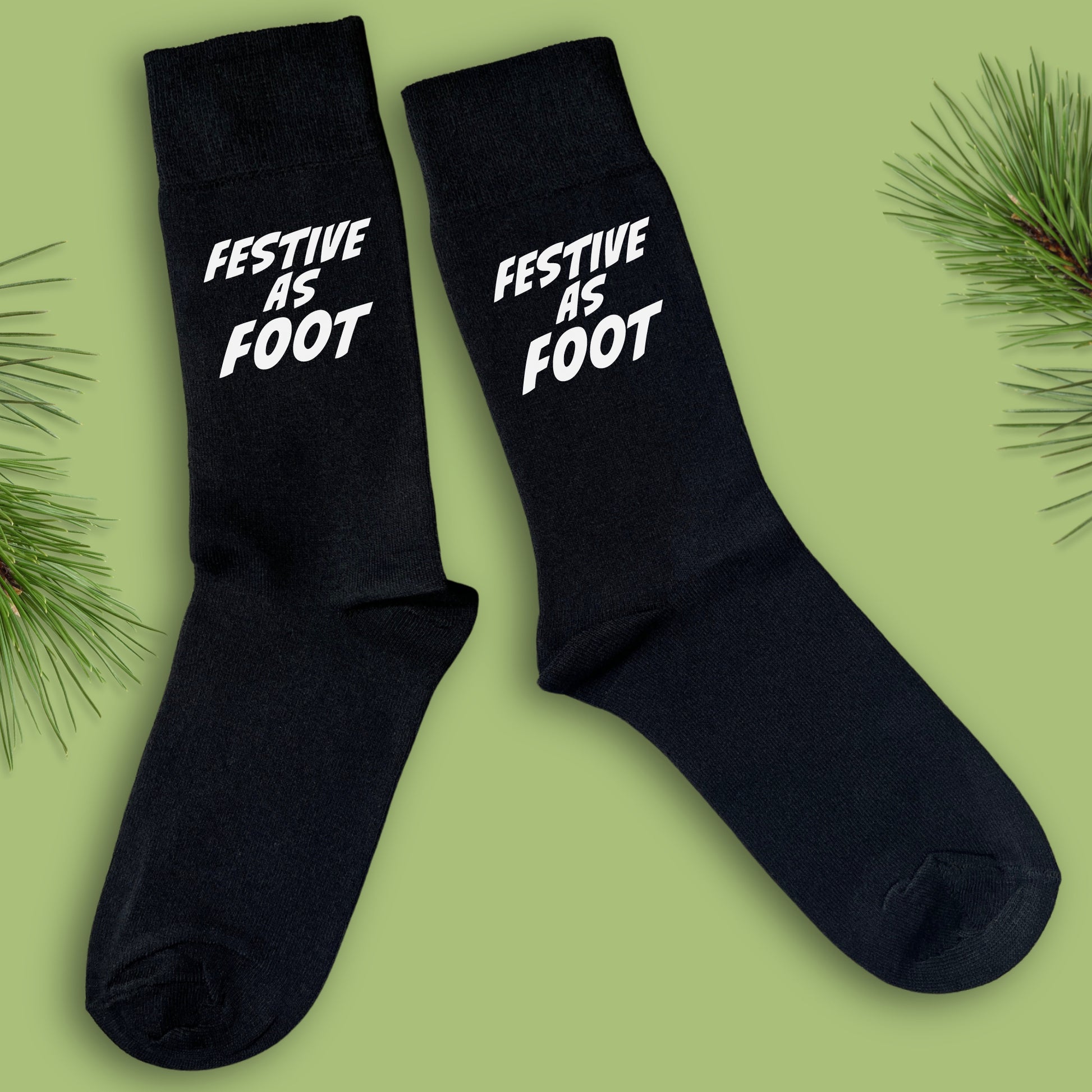 Black socks with Festive As Foot text in white 
