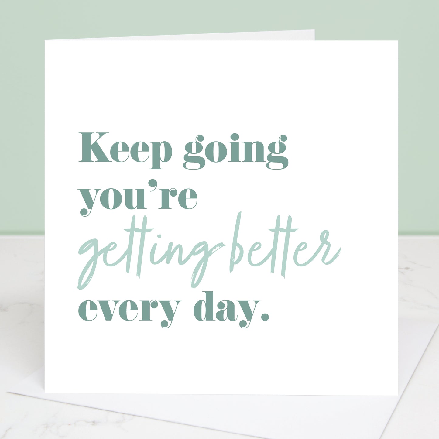 Motivational card with text 'Keep going you're getting better every day' on a light green background