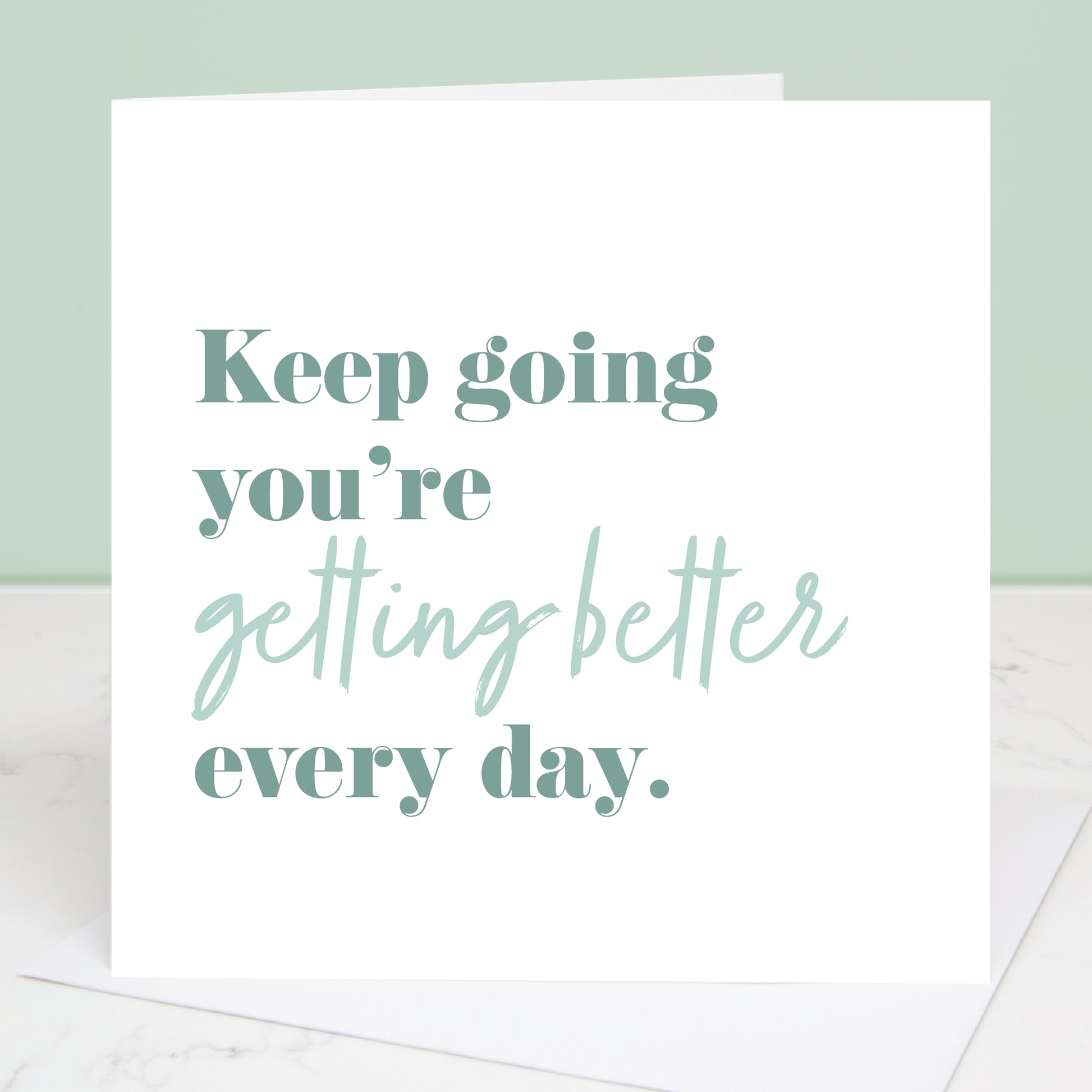 Motivational card with text 'Keep going you're getting better every day' on a light green background