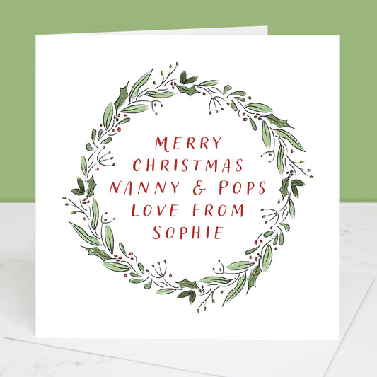 Grandparents Christmas card with green wreath and red text on a white background