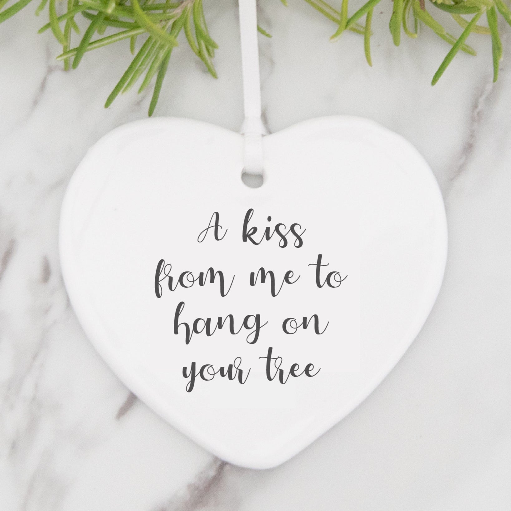 Ceramic decoration with A Kiss From Me To Hang On Your Tree message