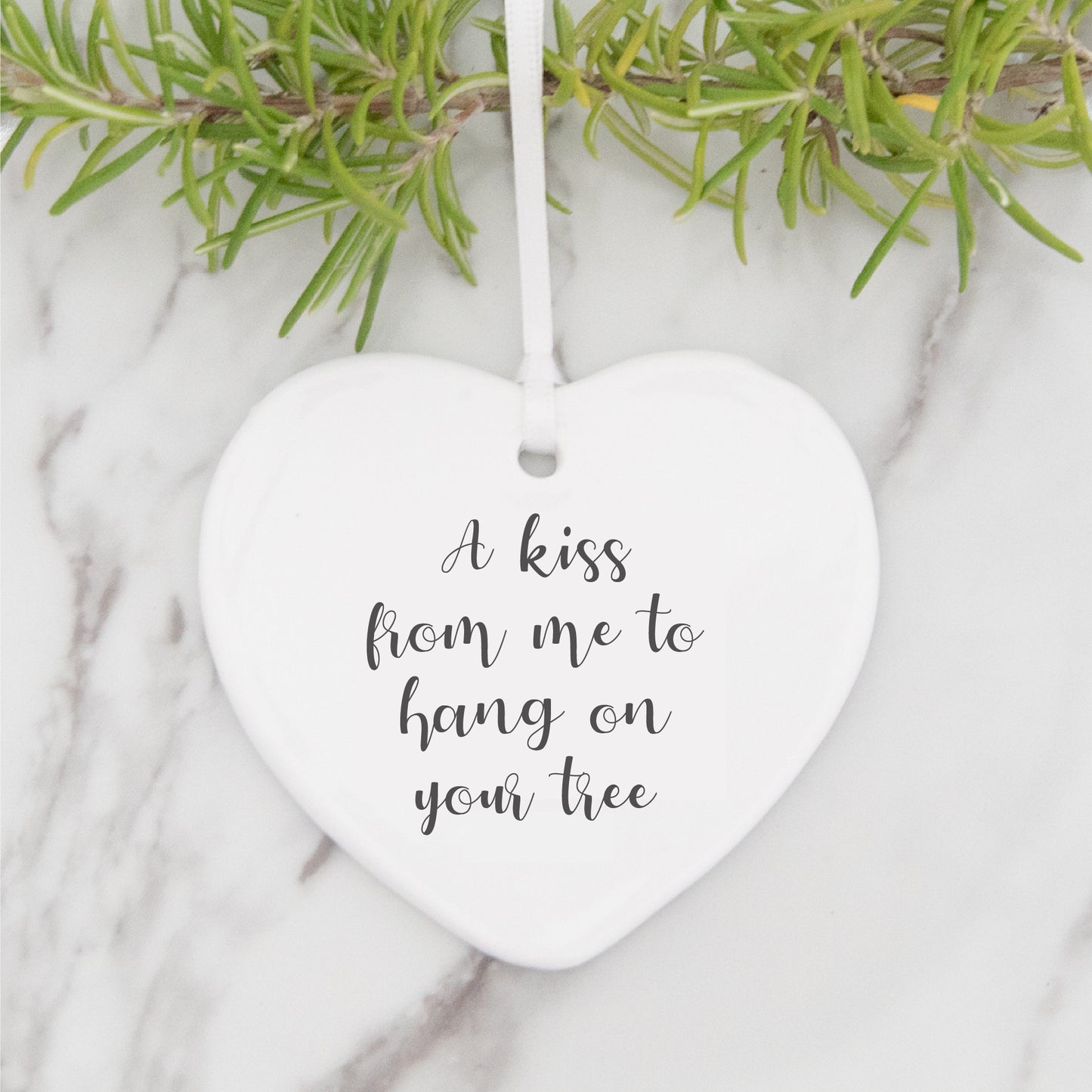 Ceramic decoration with A Kiss From Me To Hang On Your Tree message