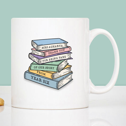 Teacher thank you mug with stack of books