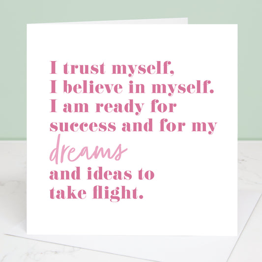 Motivational quote card with pink text on a white background